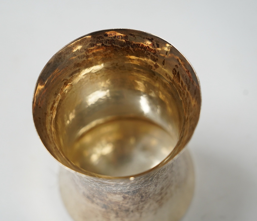 An Elizabeth II Irish planished silver beaker, William Egan & Sons, of waisted form, Dublin, 1964, 88mm, 5oz. Condition - fair.